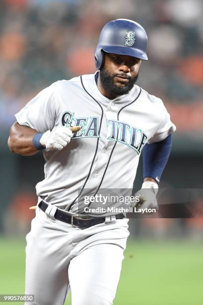 Denard Span of the Seattle Mariners rounds the bases after hitting home run during a baseball game against the Baltimore Orioles at Oriole Park at...