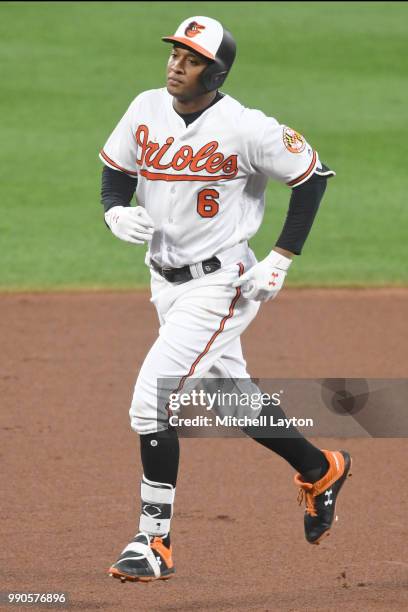 Jonathan Schoop of the Baltimore Orioles rounds the bases after hitting home run during a baseball game against the Seattle Mariners at Oriole Park...