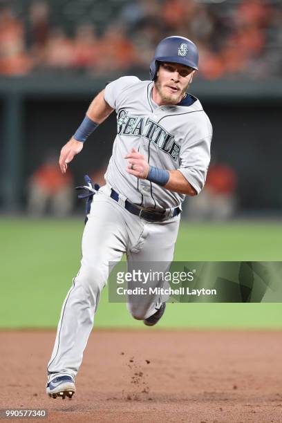 Chris Herrmann of the Seattle Mariners runs to third base during a baseball game against the Baltimore Orioles at Oriole Park at Camden Yards on June...
