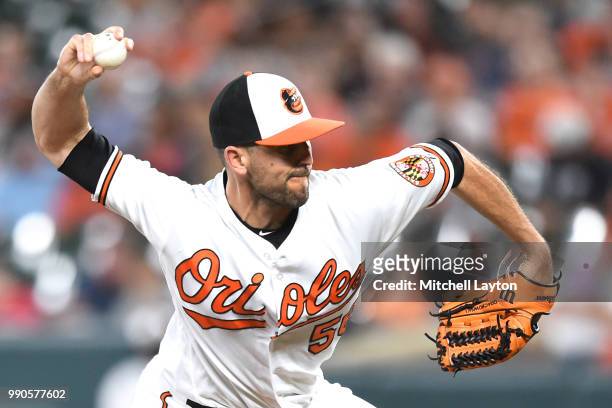 Darren O'Day of the Baltimore Orioles pitches during a baseball game against the Seattle Mariners at Oriole Park at Camden Yards on June 25, 2018 in...