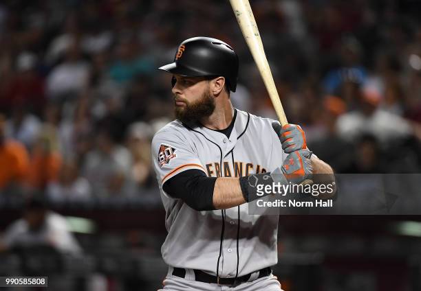 Brandon Belt of the San Francisco Giants gets ready in the batters box against the Arizona Diamondbacks at Chase Field on June 30, 2018 in Phoenix,...