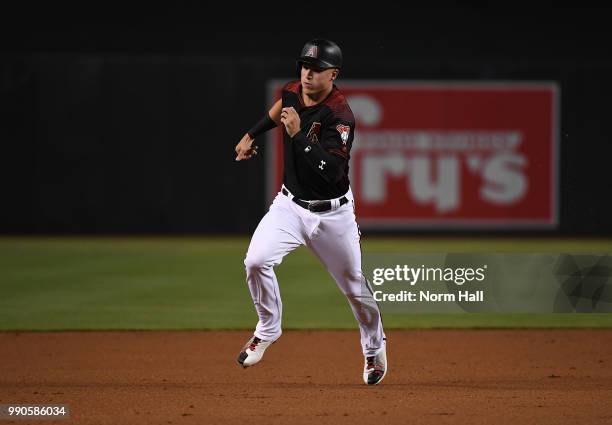 Jake Lamb of the Arizona Diamondbacks runs the bases against the San Francisco Giants at Chase Field on June 30, 2018 in Phoenix, Arizona.