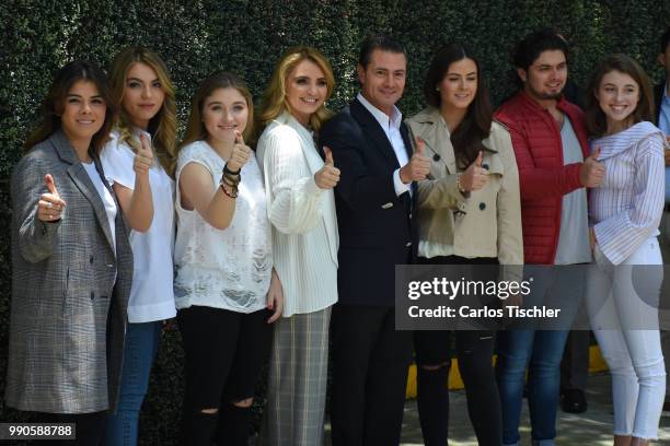 Sofia Castro, Angelica Rivera and President of Mexico Enrique Pena Nieto poss for photos after voting during the Mexico 2018 Presidential Election on...