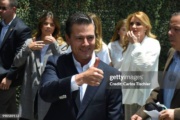 President of Mexico Enrique Pena Nieto gives a thumb up after voting during the Mexico 2018 Presidential Election on July 1, 2018 in Mexico City,...