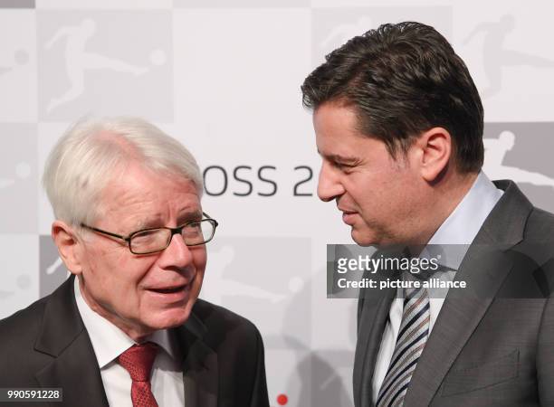 Christian Seifert, chairman of the executive board of the German Football League speaks with Borussia Dortmund president Reinhard Rauball at the...