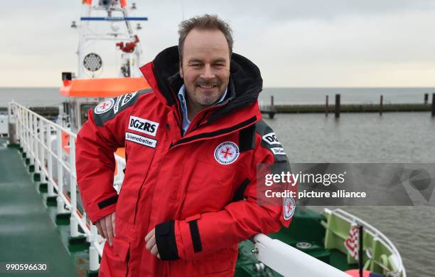 Actor Till Demtroeder, new embassador of the German Maritime Search and Rescue Service stands on deck of the Sea rescue boat "Hermann Marwede"...