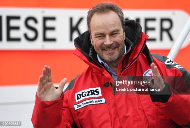 Actor Till Demtroeder, new embassador of the German Maritime Search and Rescue Service stands on deck of the Sea rescue boat "Hermann Marwede"...