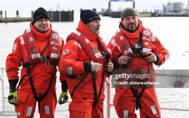 Actor Till Demtroeder, new embassador of the German Maritime Search and Rescue Service poses with crew members Domenik Holtmeier and Sven Wittko on...