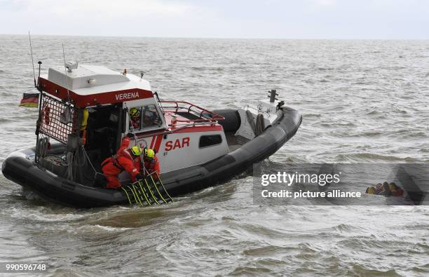 Actor Till Demtroeder, new embassador of the German Maritime Search and Rescue Service is rescued by the dinghy "Verena" wearing a survival suit in...