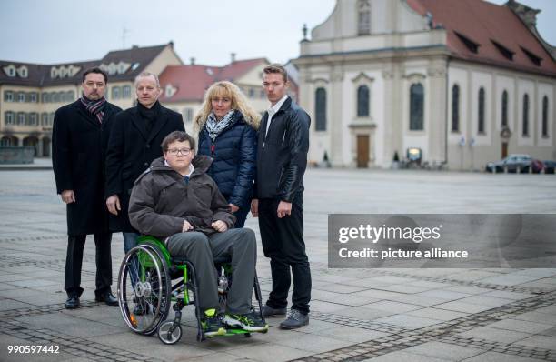 Lawyer Michael Umbach , father Reiner Knoop, mother Elke and brother Steffen stand behin Jochen Knoop in Ludwigsburg, Germany, 12 January 2018. After...