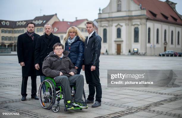 Lawyer Michael Umbach , father Reiner Knoop, mother Elke and brother Stefan stand behin Jochen Knoop in Ludwigsburg, Germany, 12 January 2018. After...