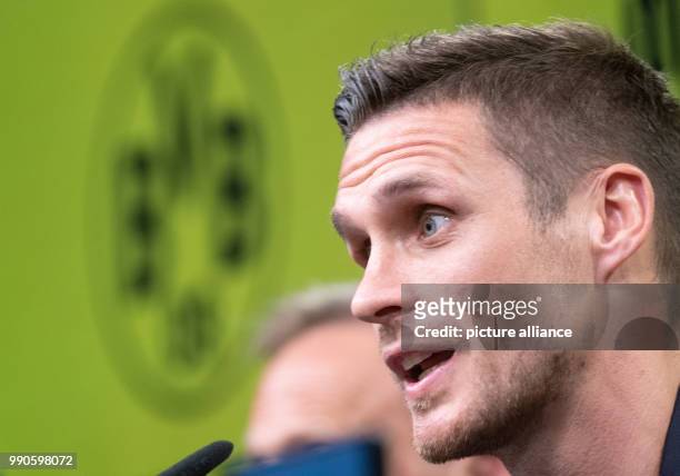 July 2018, Germany, Dortmund: The new Head of the Player Contract Department, Sebastian Kehl, from Bundesliga team Borussia Dortmund speaking at a...