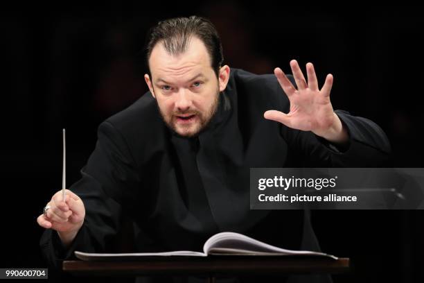 February 2018, Germany, Leipzig: The new music director of the Gewandhaus Leipzig Andris Nelsons conducts during a rehearsal of the Gewandhaus...