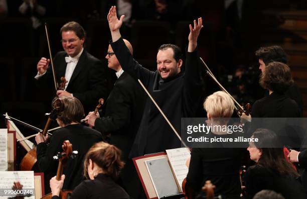 February 2018, Germany, Leipzig: The new music director of the Gewandhaus Leipzig Andris Nelsons conducts during a rehearsal of the Gewandhaus...