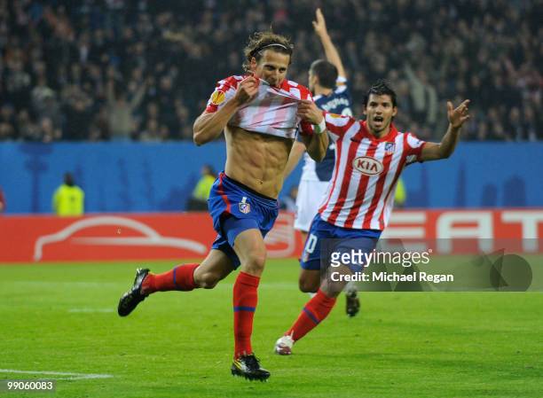 Diego Forlan of Atletico Madrid celebrates after scoring the opening goal during the UEFA Europa League final match between Atletico Madrid and...