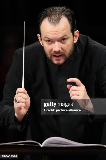 February 2018, Germany, Leipzig: The new music director of the Gewandhaus Leipzig Andris Nelsons conducts during a rehearsal of the Gewandhaus...