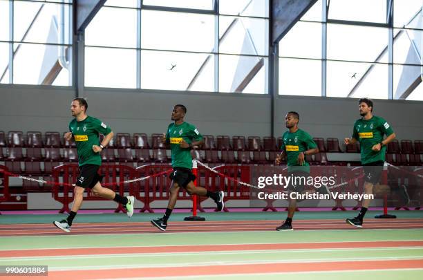 Tony Jantschke, Ibrahima Traore, Raffael and Tobias Strobl run during a lactate test of Borussia Moenchengladbach at Esprit Arena on July 03, 2018 in...