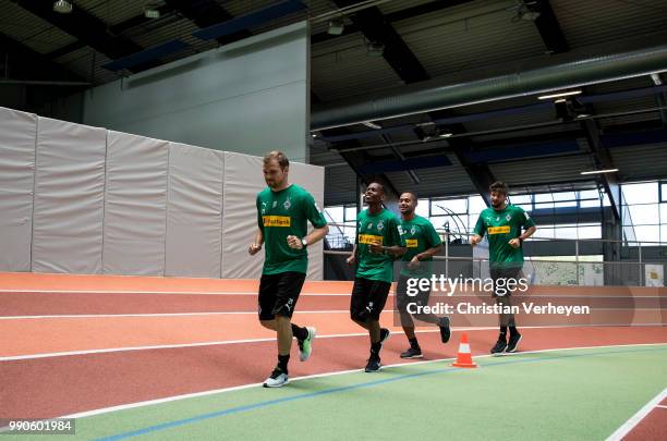 Tony Jantschke, Ibrahima Traore, Raffael and Tobias Strobl run during a lactate test of Borussia Moenchengladbach at Esprit Arena on July 03, 2018 in...