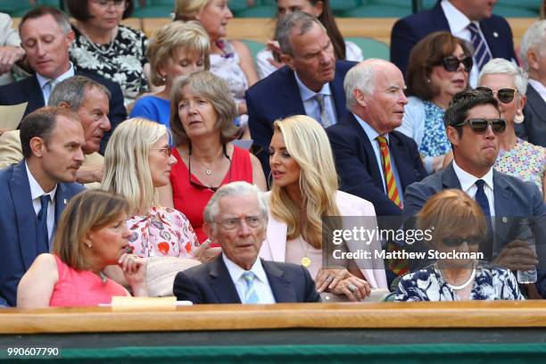 Television presenters Tess Daly and Vernon Kay watch the action on Centre Court on day two of the Wimbledon Lawn Tennis Championships at All England...