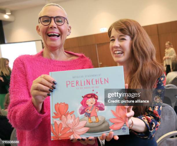 February 2018, Germany, Berlin: Natascha Ochsenknecht presents her fist children's book 'Perlinchen - ich bin anders, na und!' together with Bianca...