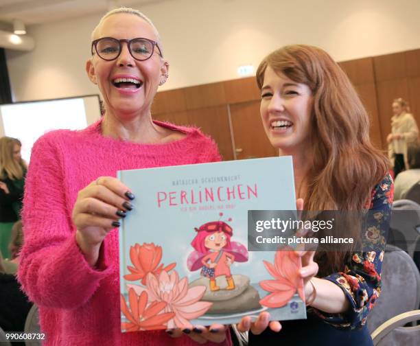 February 2018, Germany, Berlin: Natascha Ochsenknecht presents her fist children's book 'Perlinchen - ich bin anders, na und!' together with Bianca...