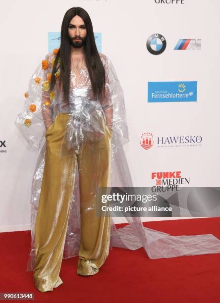 February 2018, Germany, Hamburg, Golden Camera Awards Ceremony: Singer Conchita Wurst arrives on the red carpet. Photo: Georg Wendt/dpa