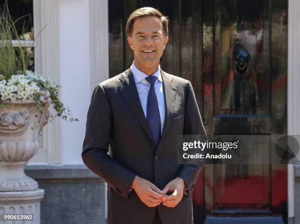 Dutch Prime Minister Mark Rutte waits to welcome his British counterpart Theresa May for a work lunch at the Catshuis, The Hague, Netherlands on July...