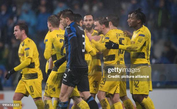 Dpatop - Dortmund's players celebrate scoring their 1st goal during the UEFA Europa League round of 32 second leg soccer match between Atalanta BC...