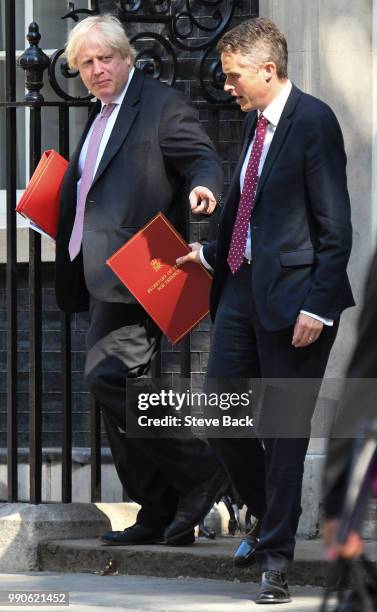 Foreign Secretary Boris Johnson, and Britain's Defence Secretary Gavin Williams leave Downing Street after the weekly cabinet meeting on July 3, 2018...