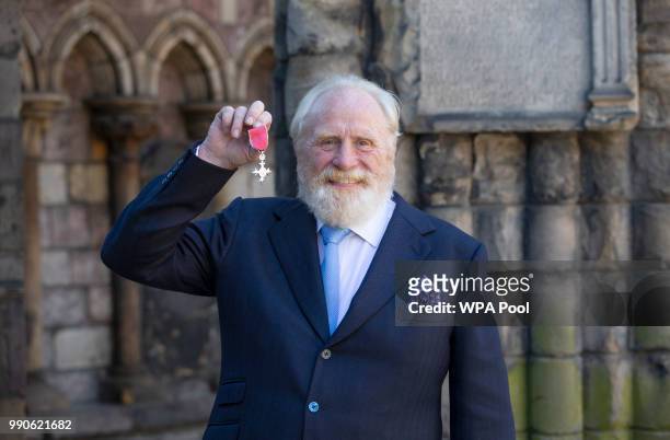 Actor James Cosmo after receiving his MBE for services to drama from Queen Elizabeth II during an Investiture ceremony at the Palace of Holyroodhouse...