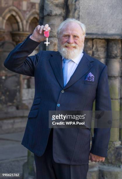 Actor James Cosmo after receiving his MBE for services to drama from Queen Elizabeth II during an Investiture ceremony at the Palace of Holyroodhouse...
