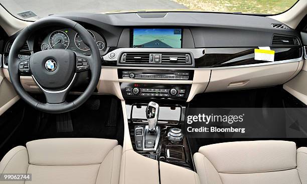 The interior of a 2011 BMW 550i sport sedan is displayed at New Jersey Motorsport Park in Millville, New Jersey, U.S., on Tuesday, May 11, 2010....