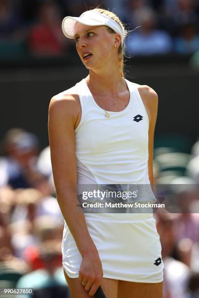 Naomi Broady of Great Britain reacts during her Ladies' Singles first round match against Garbine Muguruza of Spain on day two of the Wimbledon Lawn...