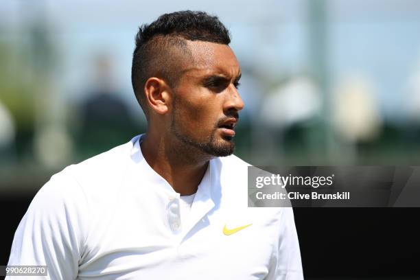 Nick Kyrgios of Australia looks on during his Men's Singles first round match against Denis Istomin of Uzbekistan on day two of the Wimbledon Lawn...