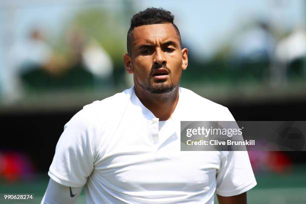 Nick Kyrgios of Australia looks on during his Men's Singles first round match against Denis Istomin of Uzbekistan on day two of the Wimbledon Lawn...