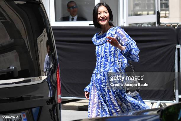 Liu Wen is seen arriving at Chanel Fashion Show during Haute Couture Fall Winter 2018/2019 on July 3, 2018 in Paris, France.