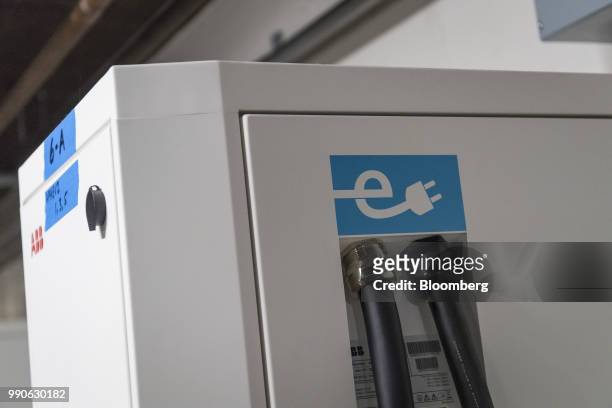 Electric car charging stations stand in San Francisco, California, U.S., on Monday, July 2, 2018. Photographer: David Paul Morris/Bloomberg via Getty...