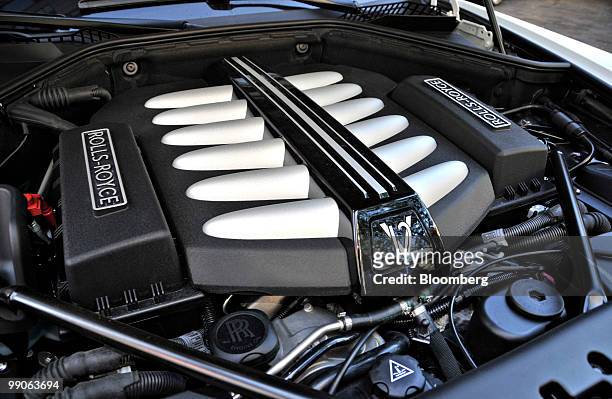 The 6.6-liter twin-turbo V12 engine of a 2010 Rolls Royce Ghost is displayed for a photograph in Philadelphia, Pennsylvania, U.S., on Monday, May 10,...