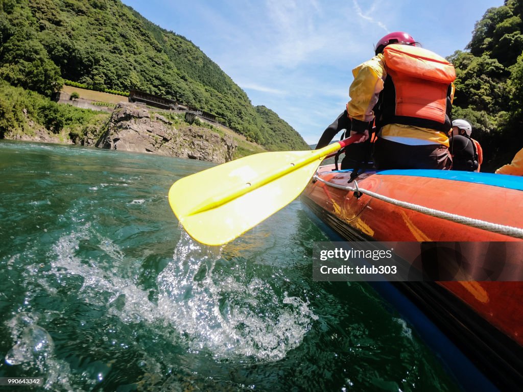 Low angle view of a white water river rafting excursion