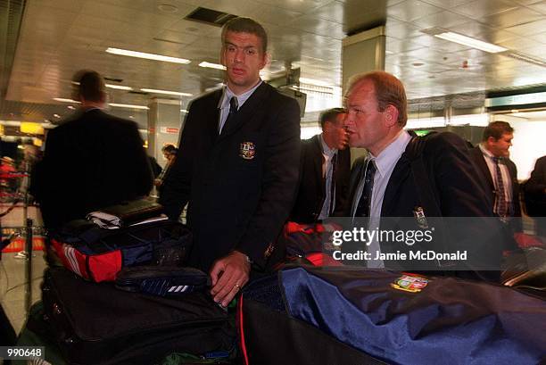 Tour Captain Martin Johnson and TourAssistant Coach Andy Robinson at Heathrow Airport prior to their departure on the British Lions tour of...