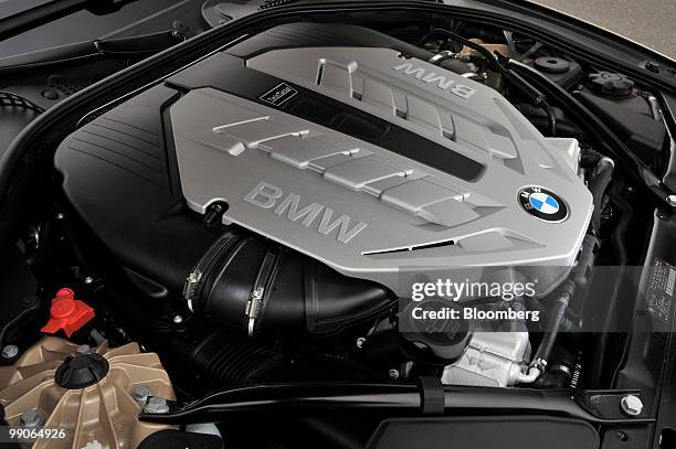 Liter V-8 engine is displayed under the hood of a 2011 BMW 550i sport sedan at New Jersey Motorsport Park in Millville, New Jersey, U.S., on Tuesday,...