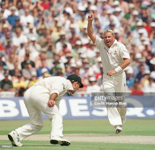 Shane Warne of Ausralia celebrates ater getting the wicket of Mark Butcher caught by Ricky Ponting for 38 during the opening day of the npower first...