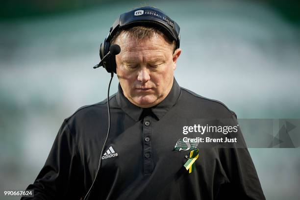 Head coach Chris Jones of the Saskatchewan Roughriders on the sideline during the game between the Montreal Alouettes and Saskatchewan Roughriders at...