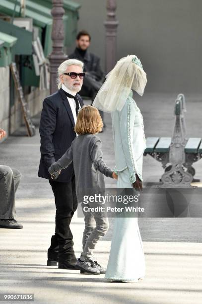 Fashion designer Karl Lagerfeld walks the runway during the Chanel Haute Couture Fall Winter 2018/2019 show as part of Paris Fashion Week on July 3,...