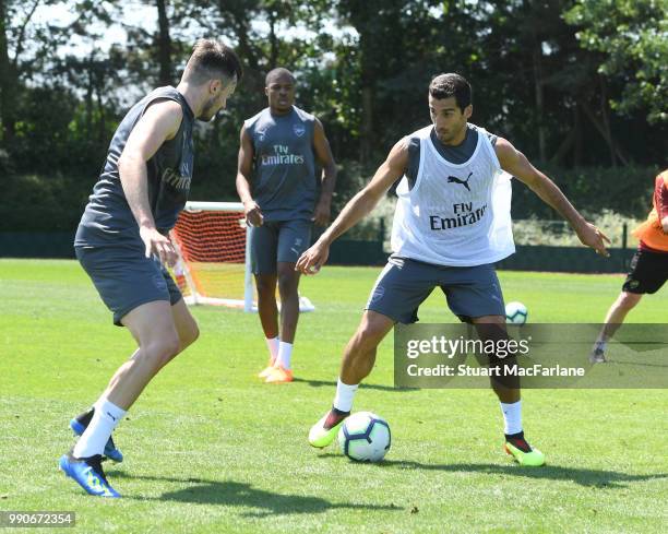 Carl Jenkinson and Henrikh Mkhitaryan of Arsenal during a training session at London Colney on July 3, 2018 in St Albans, England.