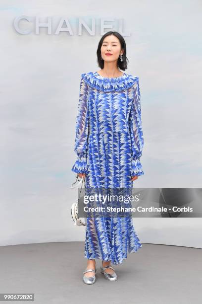 Liu Wen attends the Chanel Haute Couture Fall/Winter 2018-2019 show as part of Haute Couture Paris Fashion Week on July 3, 2018 in Paris, France.