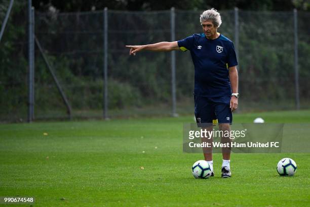 West Ham Manager Manuel Pellegrini gives instructions during a training session on the West Ham Pre-Season Tour to Switzerland on July 3, 2018 in Bad...