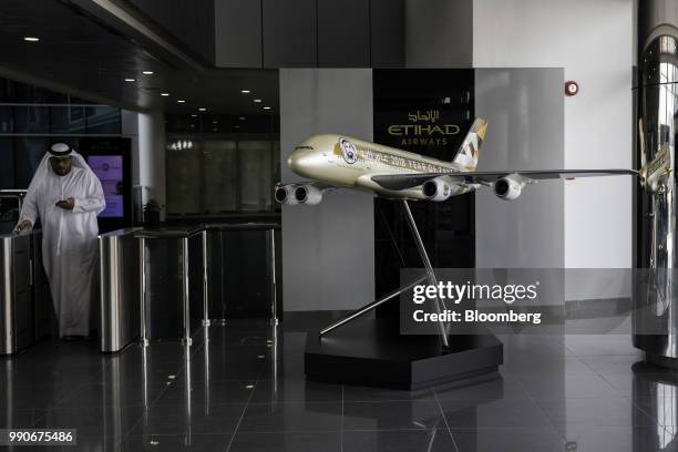 Model Airbus SE A380 aircraft sits on display in the reception area at the Etihad Group headquarters in Abu Dhabi, United Arab Emirates, on Tuesday,...