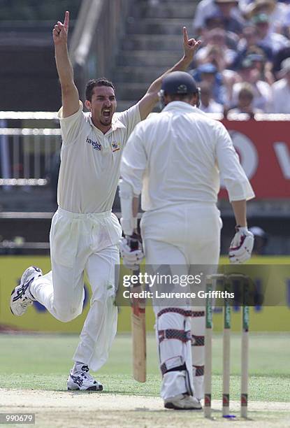 Jason Gillespie of Australia celebrates the wicket of Mike Atherton of England during the opening day of the npower Ashes first test match between...