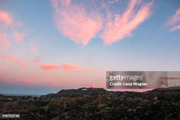 cloud formation over hollywood hills - hollywood stock pictures, royalty-free photos & images